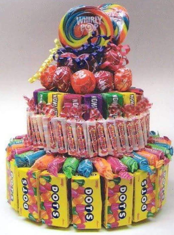 Candy cake made of Dots, lollipops, and wrapped candy