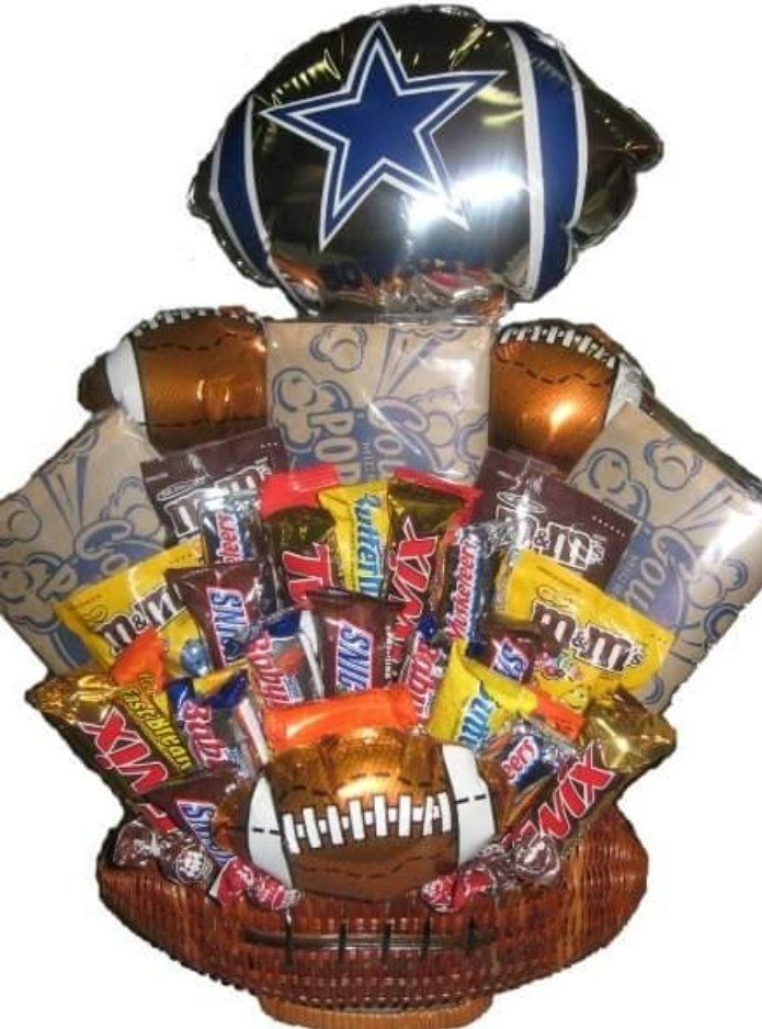Dallas Cowboys candy bouquet in a football basket with balloons