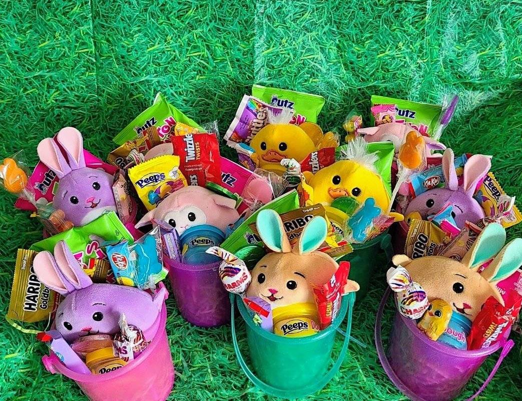 Colorful Easter treat buckets filled with candy and toys