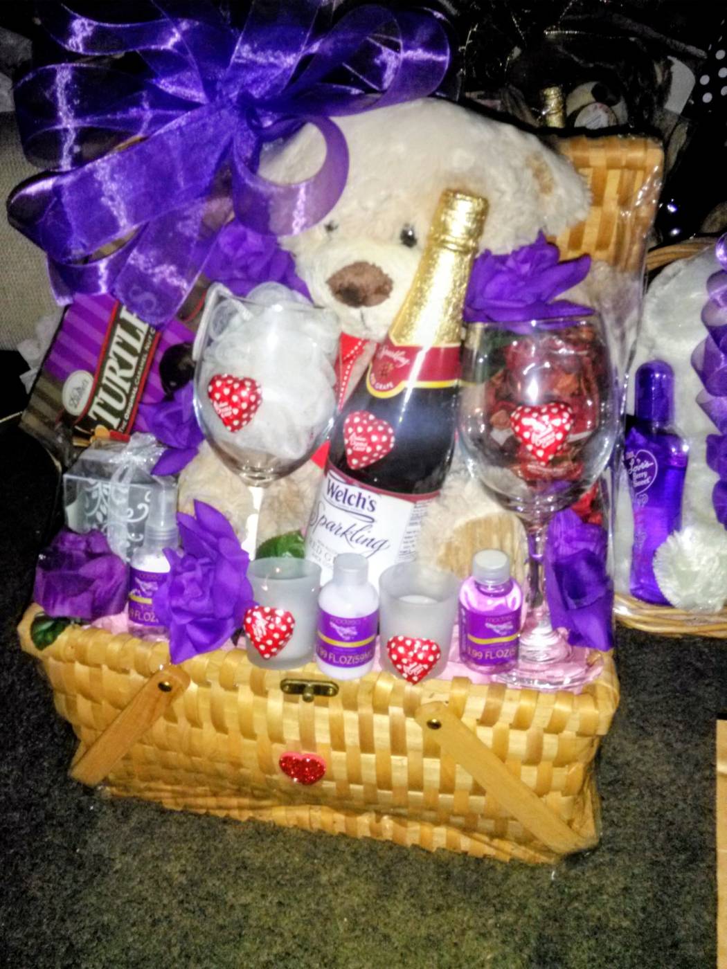 Purple romance spa basket with teddy bear, champagne, lotion, and bath products