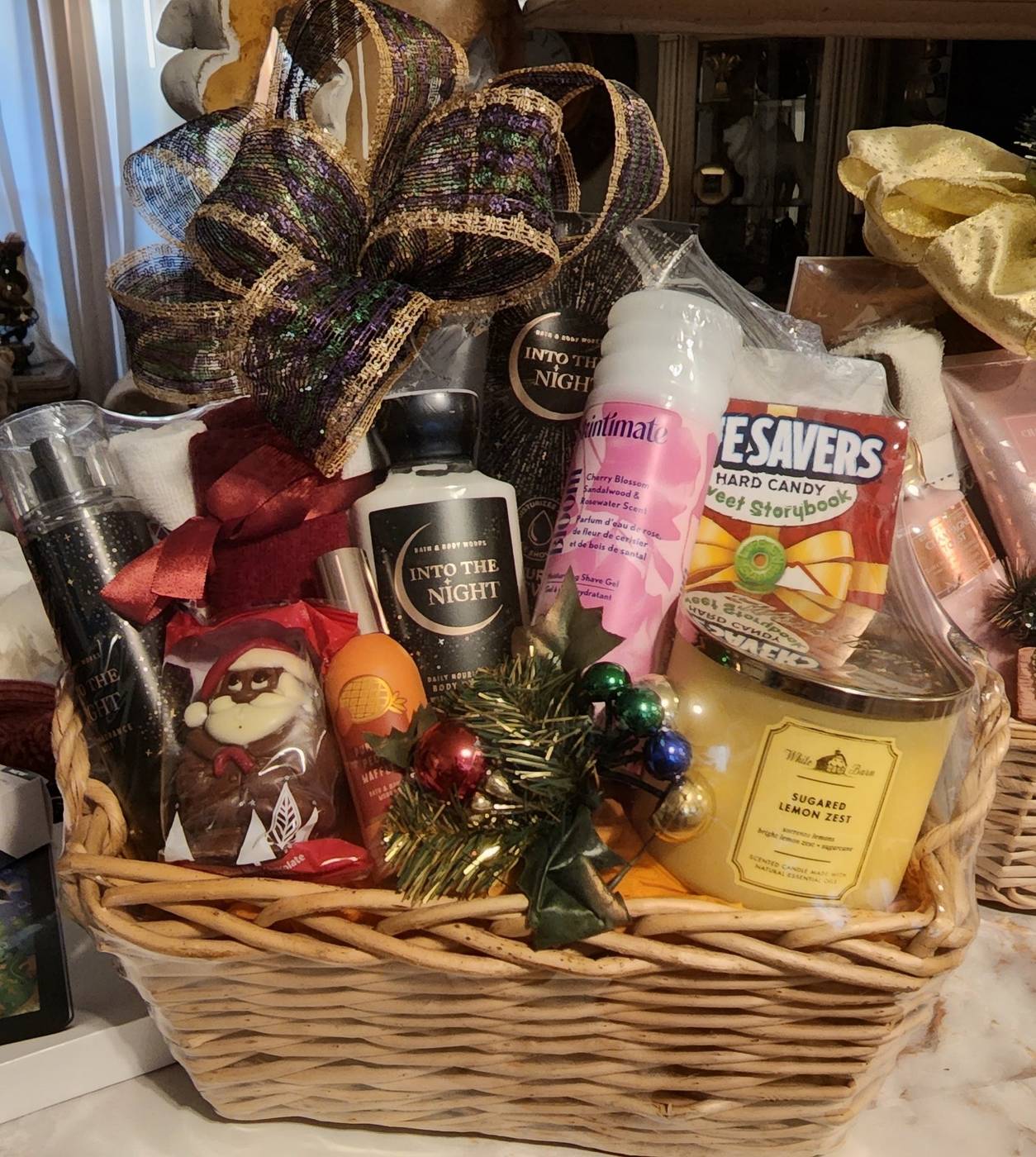 Holiday champagne toast basket with sparkling cider, glasses, and treats