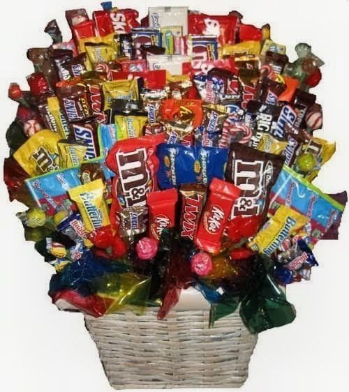 M&M's candy bouquet with balloons and snacks in a blue tub