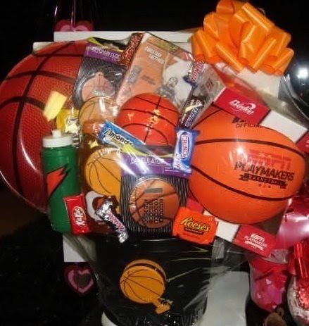 Basketball sport basket with ball, snacks, and fan gear