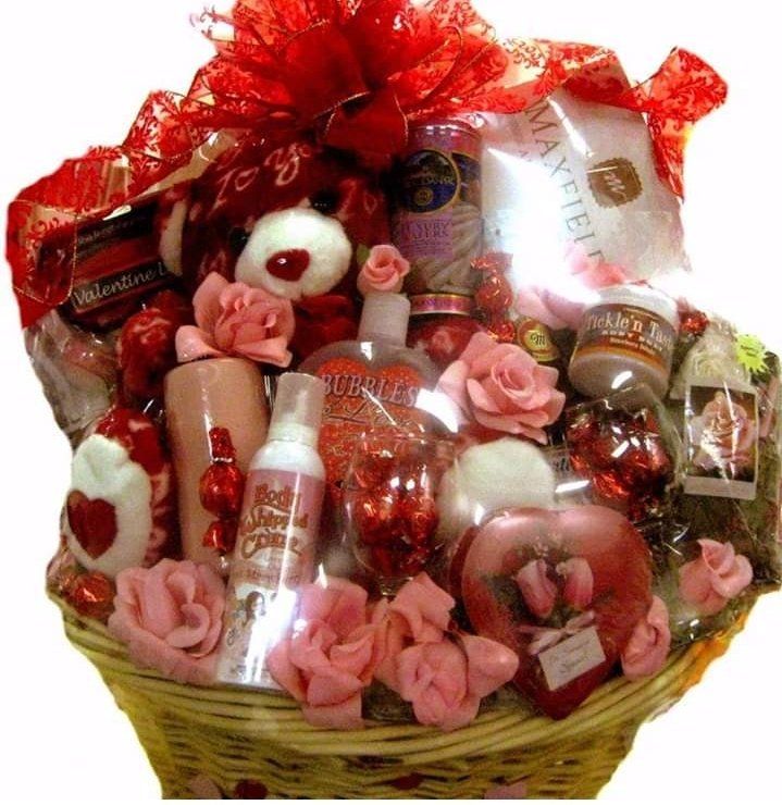 Red Valentine basket with teddy bear, chocolates, body spray, and sparkling cider