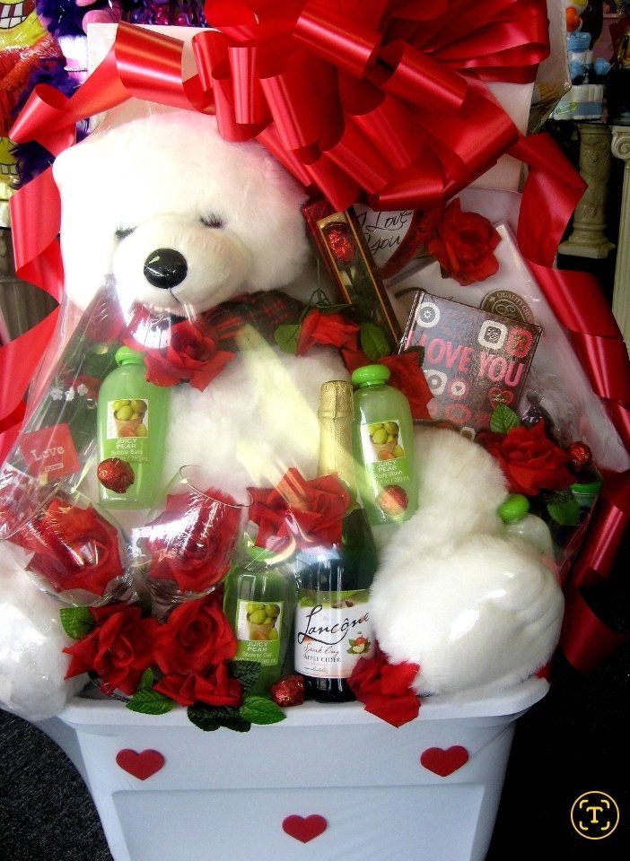 Valentine love tub with teddy bear, sparkling cider, and heart treats