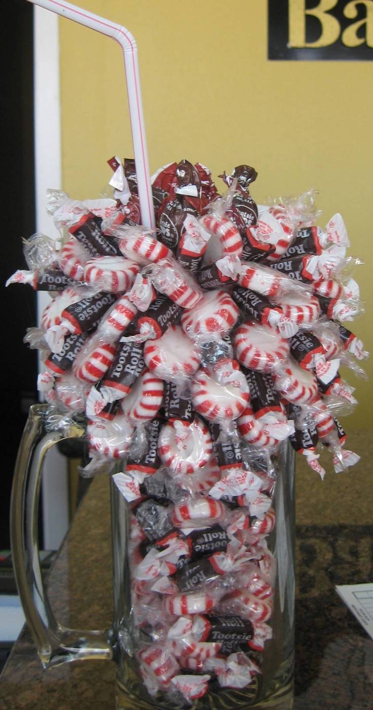Peppermint and Tootsie Roll candy bouquet in a glass mug