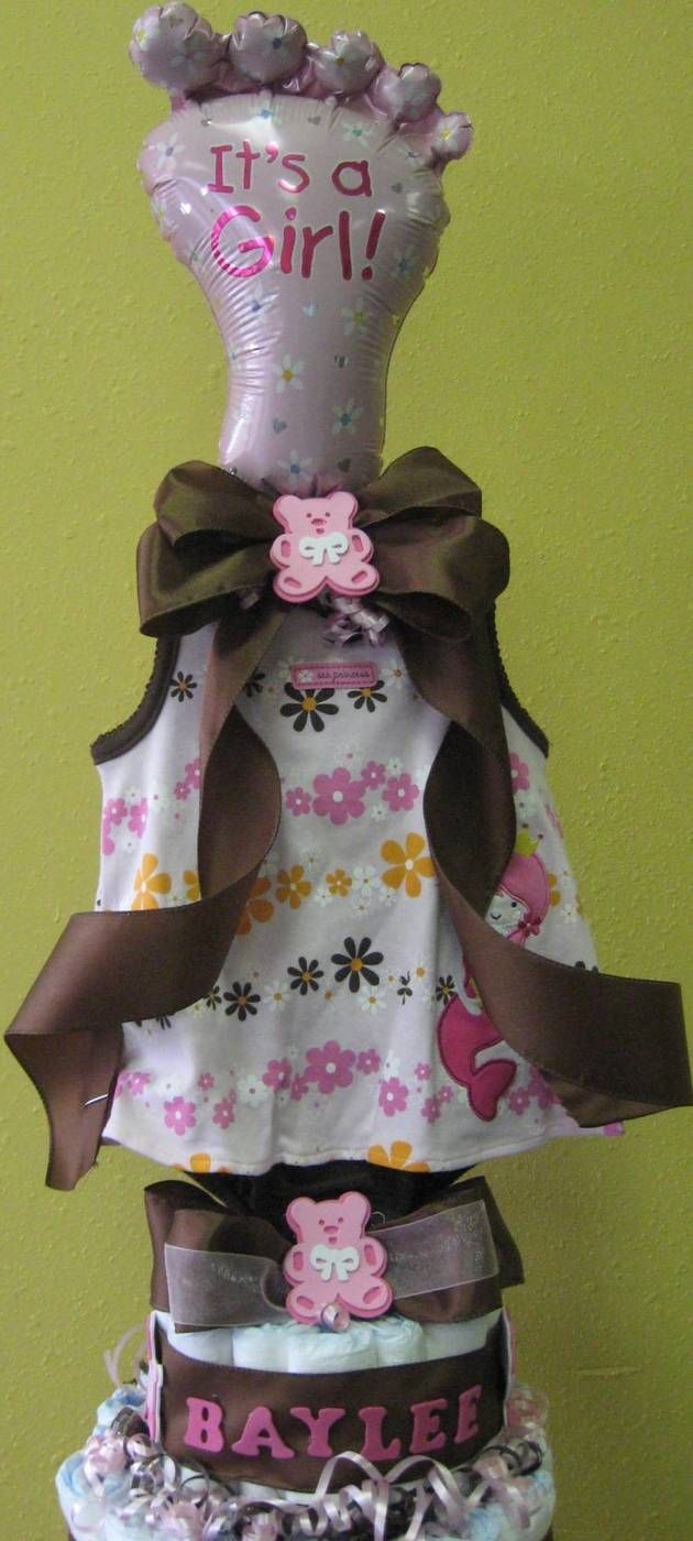 Personalized baby girl diaper cake with It's a Girl balloon and name