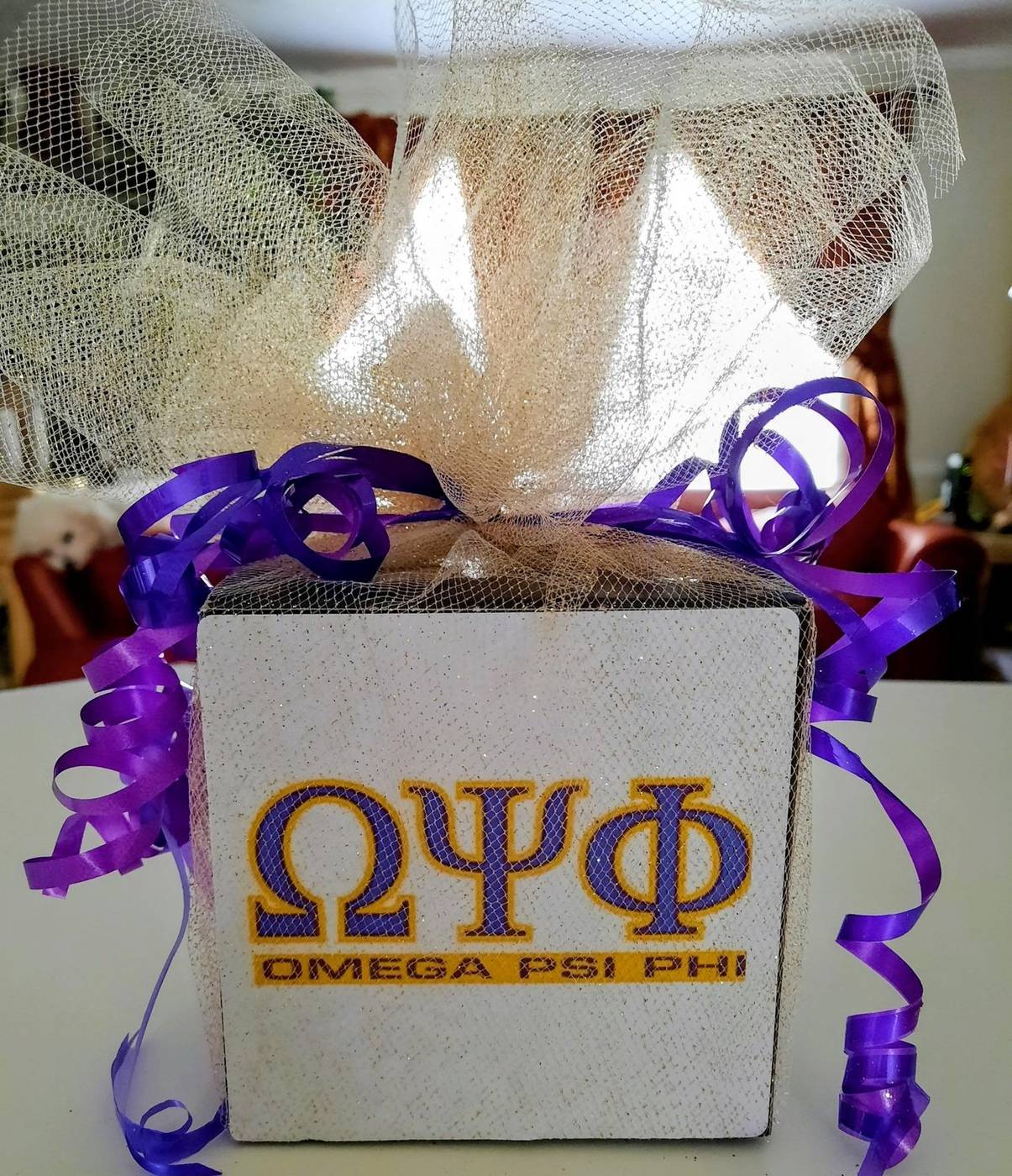Omega Psi Phi Greek letters purple and gold party favor box