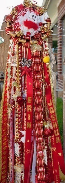 Red and gold homecoming mum with teddy bear and Erin and Joshua Woods ribbons