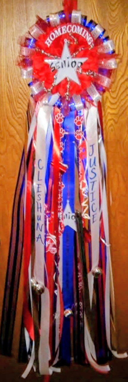 Red white and blue homecoming senior mum with star and name ribbons