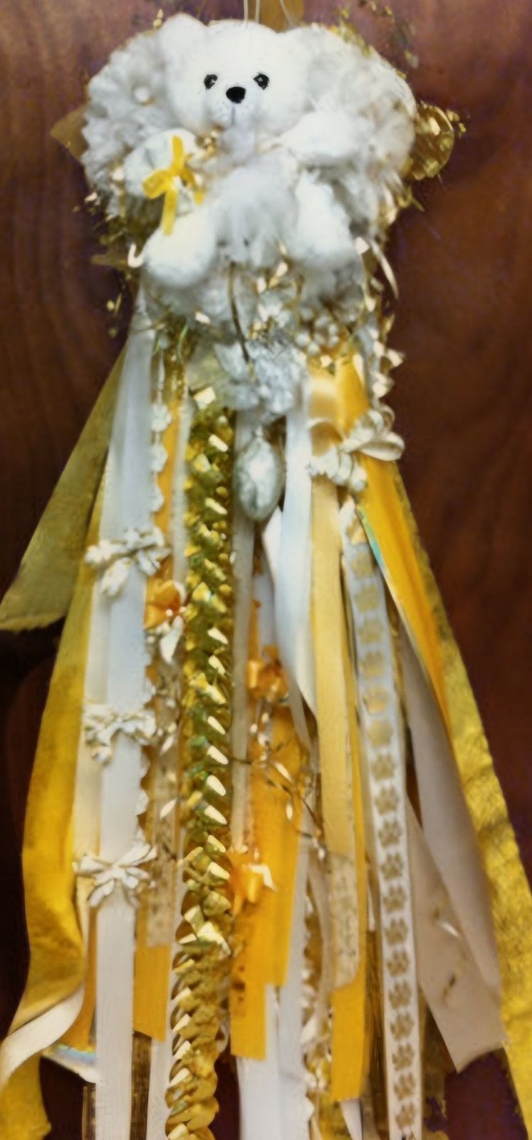 White and gold homecoming mum with teddy bear